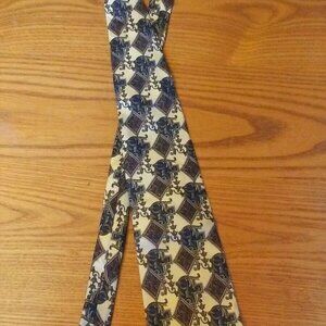Bill Blass vintage men's silk tie, 100% silk, blue and gold, floral/geometric